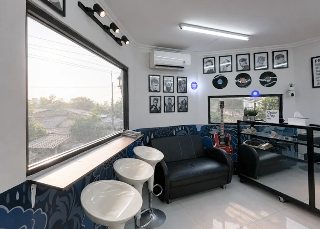 Professional barber providing excellent service to a client